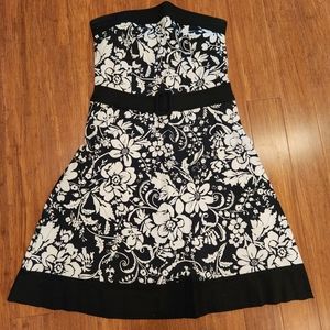B. Smart black and white floral dress, size 10